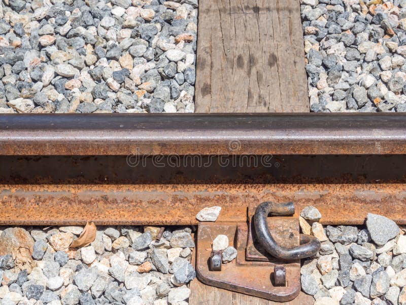 The Closeup of an Old Railway Tracks with Wood and Gravel Stock Image