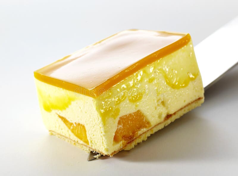 Closeup orange mousse cake royalty free stock photography