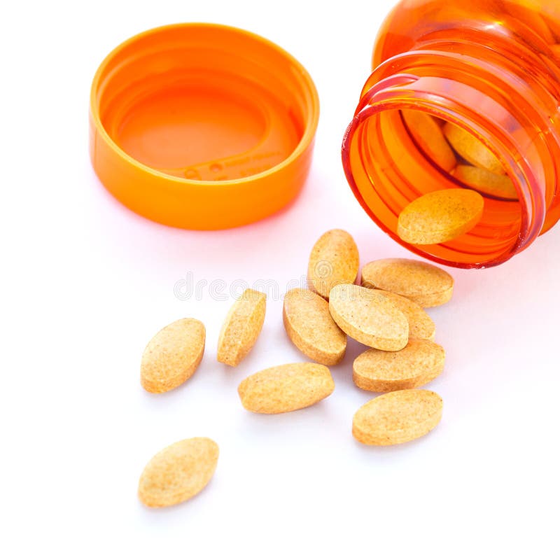 Closeup of Orange Pills and Pill Bottle Stock Photo Image of science