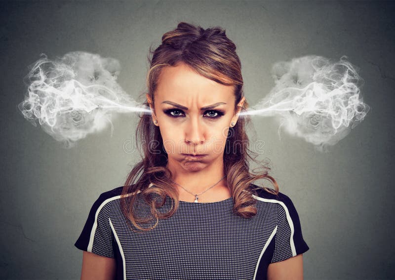 Closeup portrait of angry young woman, blowing steam coming out of ears