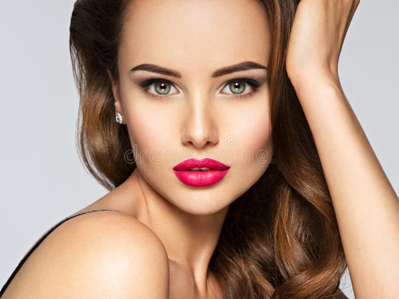 Closeup portrait of a beautiful woman with red lips. royalty free stock images Closeup portrait of a beautiful woman with red lips. royalty free stock images