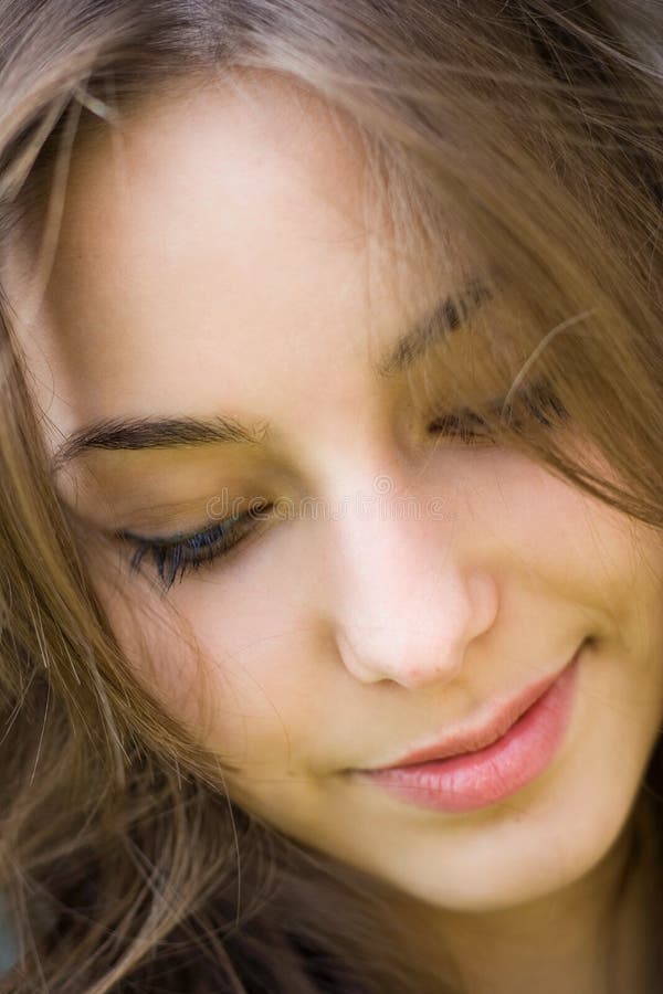 Closeup portrait of a beautiful young brunette.