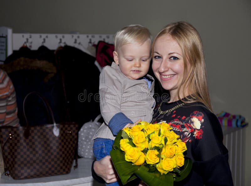 Closeup portrait of beautiful young mother with son