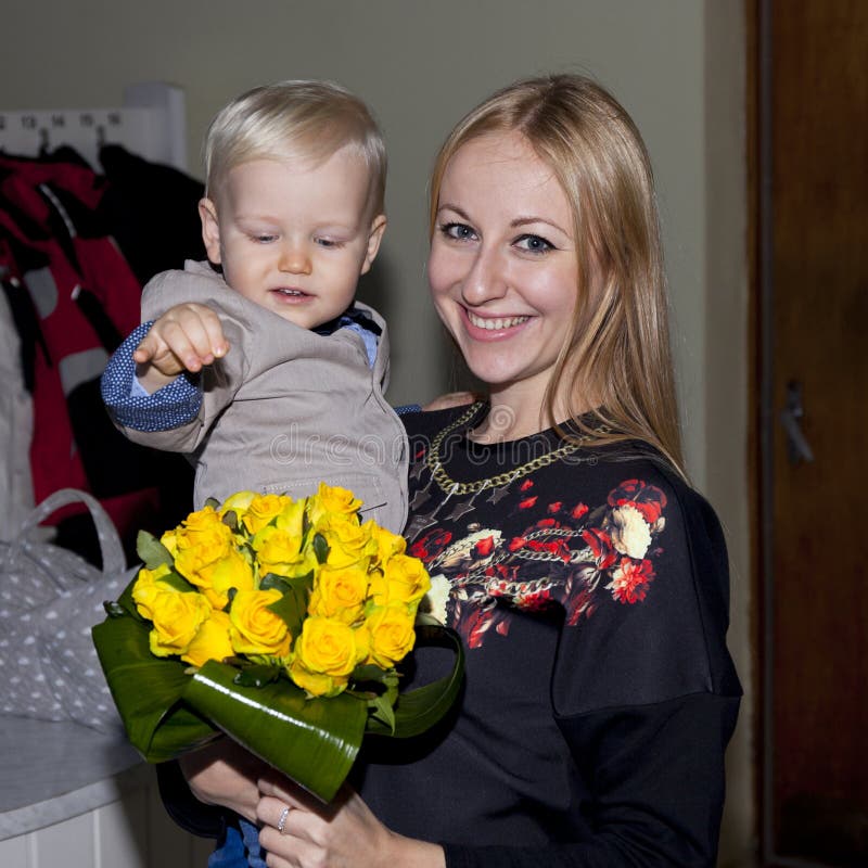 Closeup portrait of beautiful young mother with son