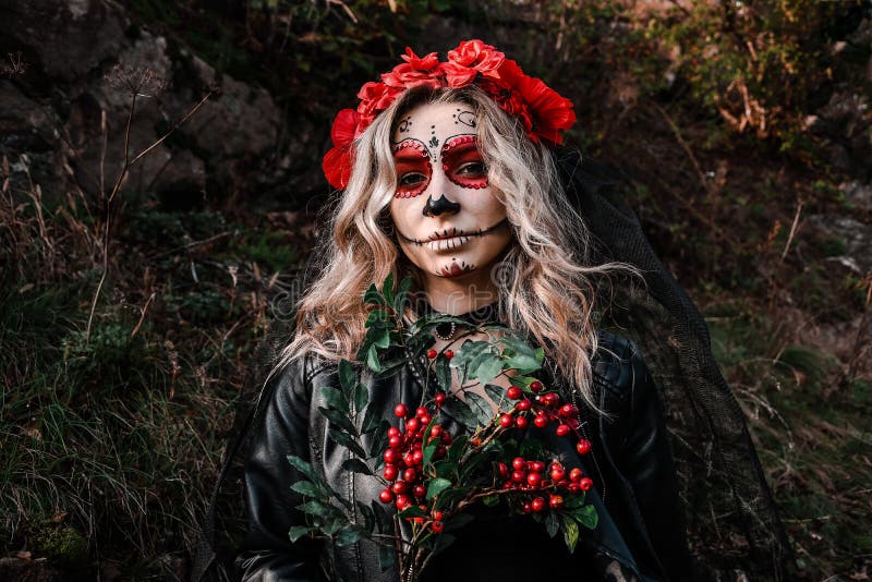 Young Woman with Calavera Makeup (sugar Skull) Piercing Voodoo Doll ...