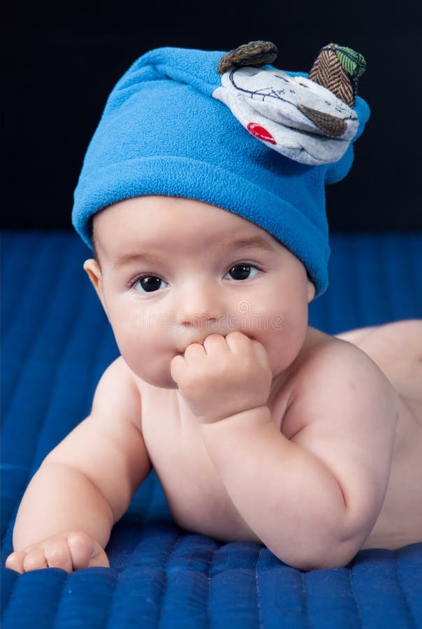 Closeup portrait of cute smiling baby boy