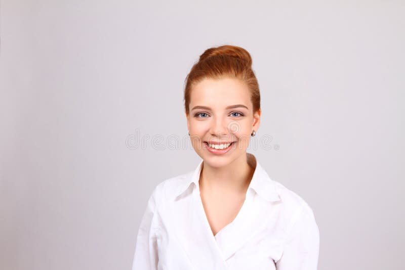 Closeup portrait of cute young business woman smiling