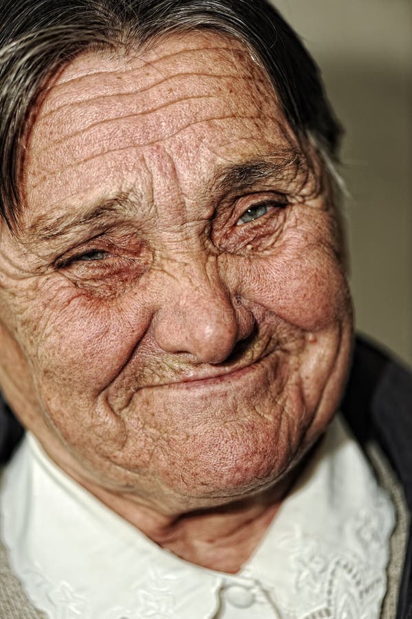 Closeup portrait of elderly happy woman