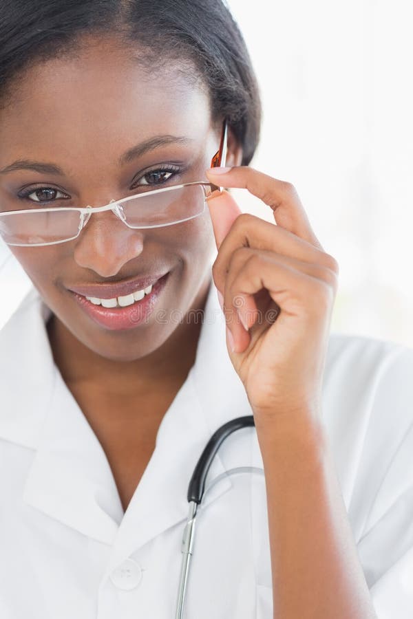 Closeup portrait of a female doctor with eye glasses stock image Closeup portrait of a female doctor with eye glasses stock image