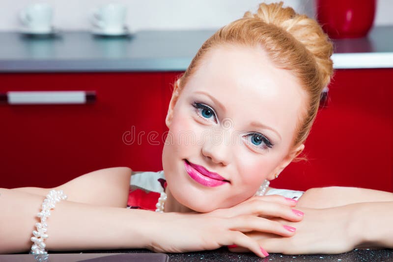 Closeup portrait of girl in interior of red modern