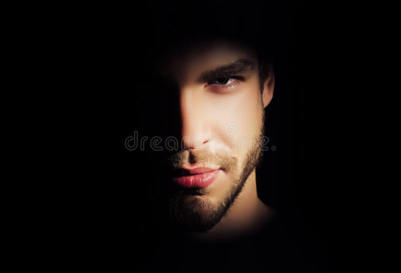 Closeup Portrait of Handsome Man with Strong Look Standing in Dark Light in  Studio on Black Background Stock Image - Image of background, muscle:  214453255