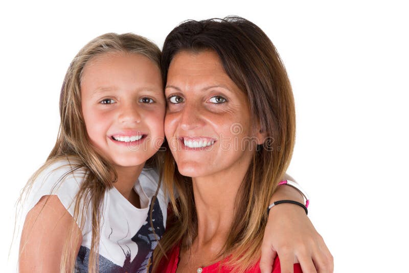 Closeup portrait of happy white mother and young daughter isolated on white wall in Happy family people concept stock images Closeup portrait of happy white mother and young daughter isolated on white wall in Happy family people concept stock images