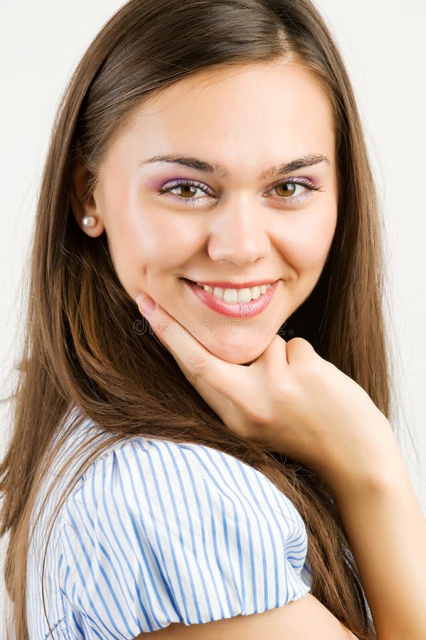 Closeup portrait of a happy young woman smiling