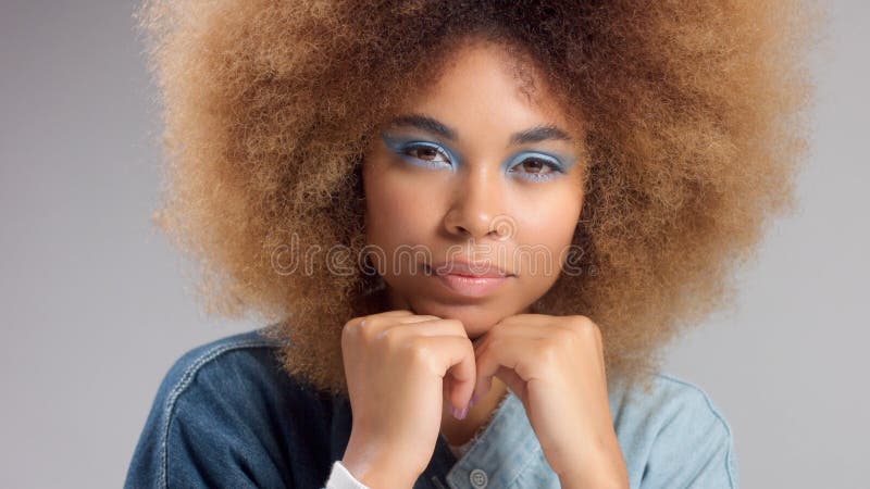 Portrait of Mixed Race Black Woman with Afro Hair Wears a Denim Oversize Shirt Stock Image - Image of afican, race: 168981985 Portrait of Mixed Race Black Woman with Afro Hair Wears a Denim Oversize Shirt Stock Image - Image of afican, race: 168981985