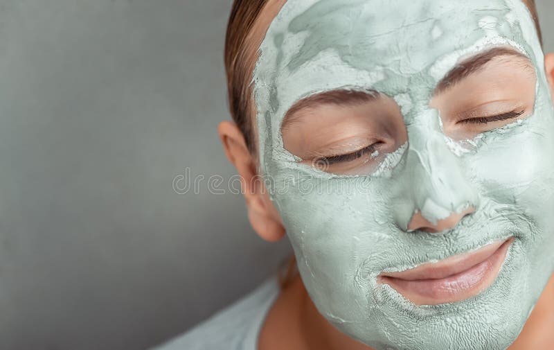 Facial Mask on Beautiful Face Stock Photo - Image of hand, portrait ...