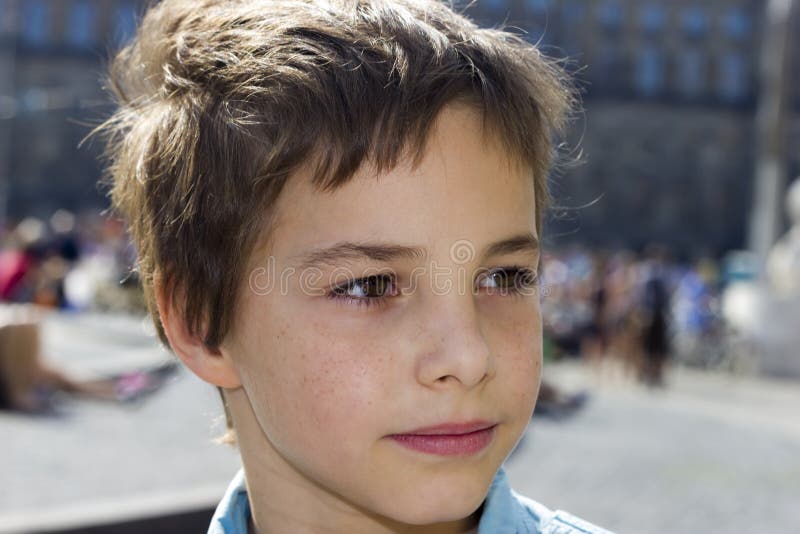 Closeup Portrait of Pre-Teen Boy Smiling.