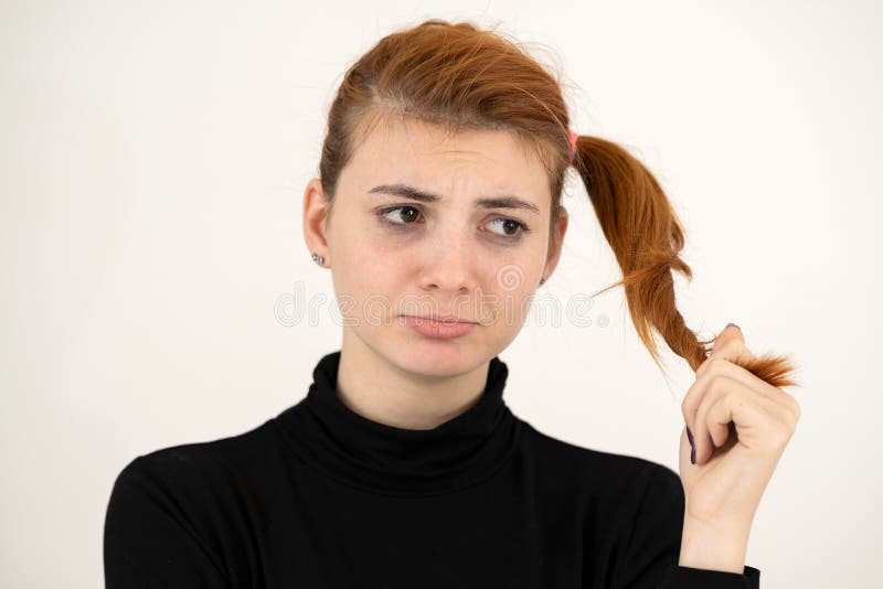 Closeup Portrait of a Sad Redhead Teenage Girl with Childish Hairstyle ...