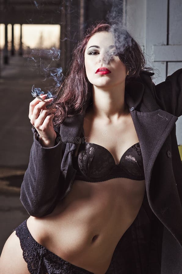 Closeup Portrait Of Smoking Young Girl In Underwear An