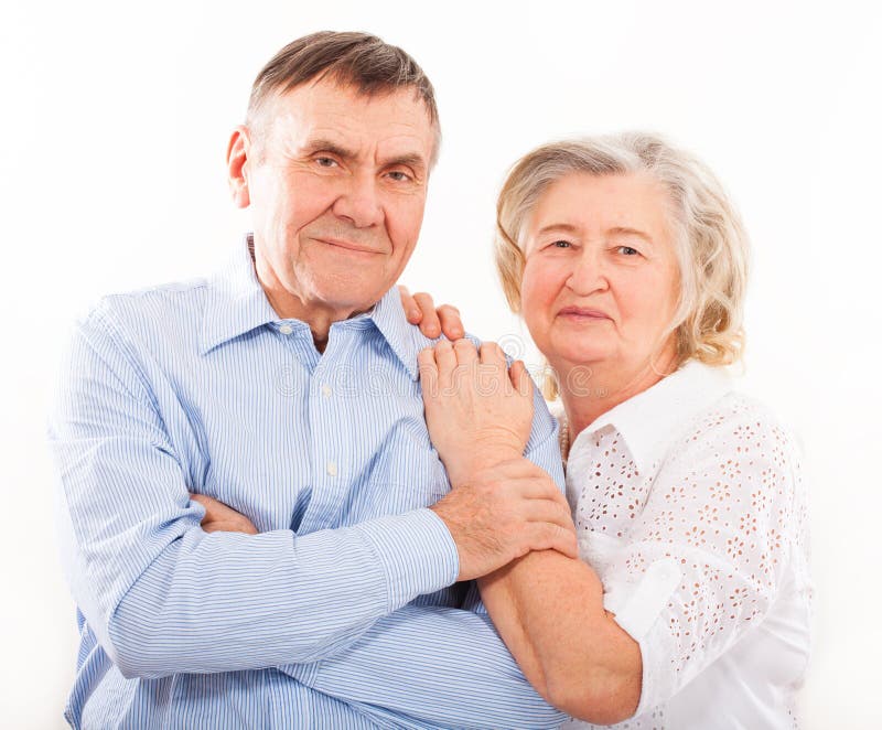 Closeup portrait of smiling elderly couple