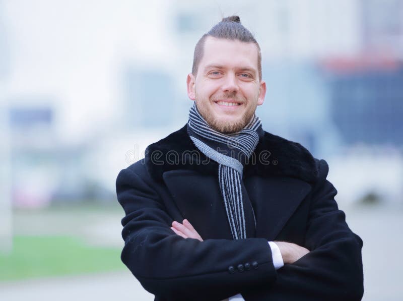 Closeup.portrait of a successful man on blurred background