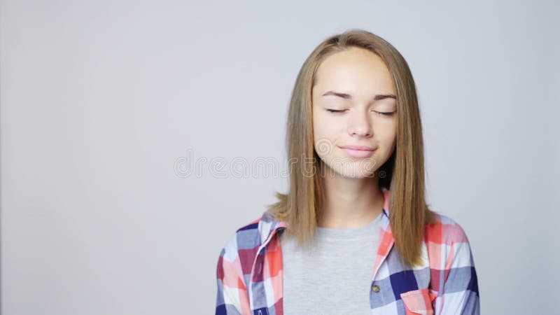 Closeup portrait of teen girl with closed eyes