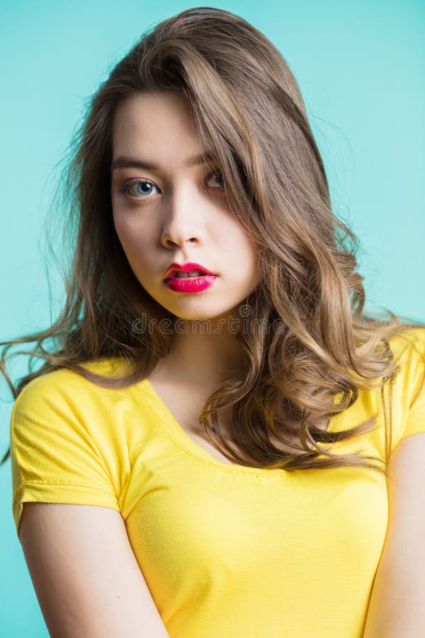Close up portrait of a young beautiful brunette woman looking at camera, the surprised look stock image Close up portrait of a young beautiful brunette woman looking at camera, the surprised look stock image