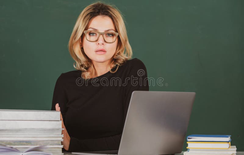 Sexy Older Teacher Educating Her Students