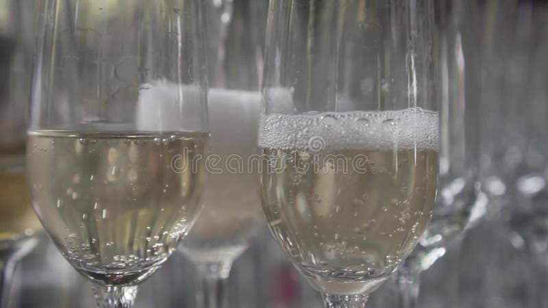 Pouring champagne into the glass