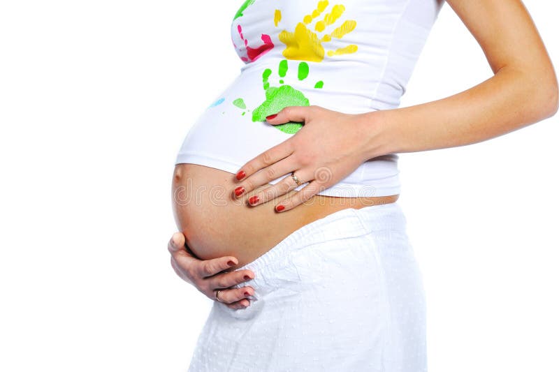 Closeup of pregnant woman stomach isolated on white royalty free stock photography Closeup of pregnant woman stomach isolated on white royalty free stock photography
