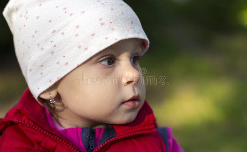 Closeup profile of a little girl stock image