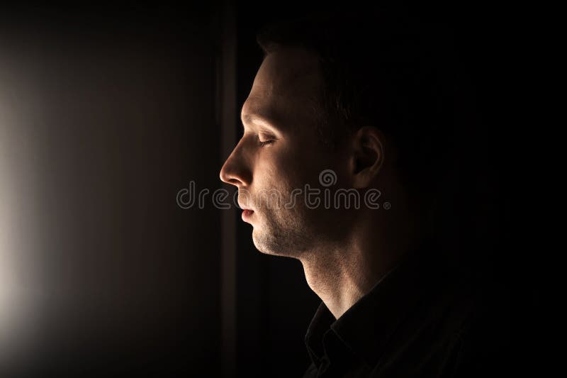 Closeup profile portrait of man with closed eyes royalty free stock photography