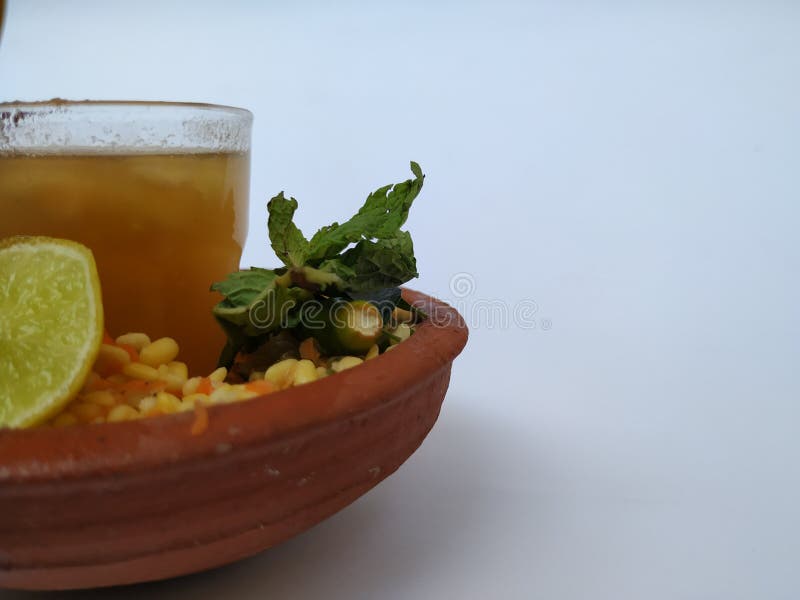 Ram Navami Hindu Festival Food Musk Melon Cool drink, Hesaru Bele with Lemon in a Sand Bowl on White Background royalty free stock image