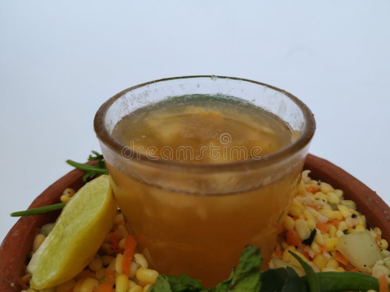 Ram Navami Hindu Festival Food Musk Melon Cool drink, Hesaru Bele with Lemon in a Sand Bowl on White Background royalty free stock images