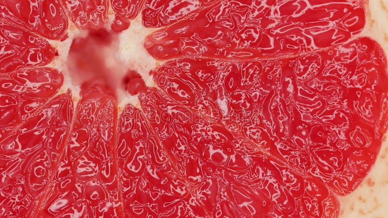 Closeup of red grapefruit. Fragrant fresh delicious slice of grapefruit. stock video