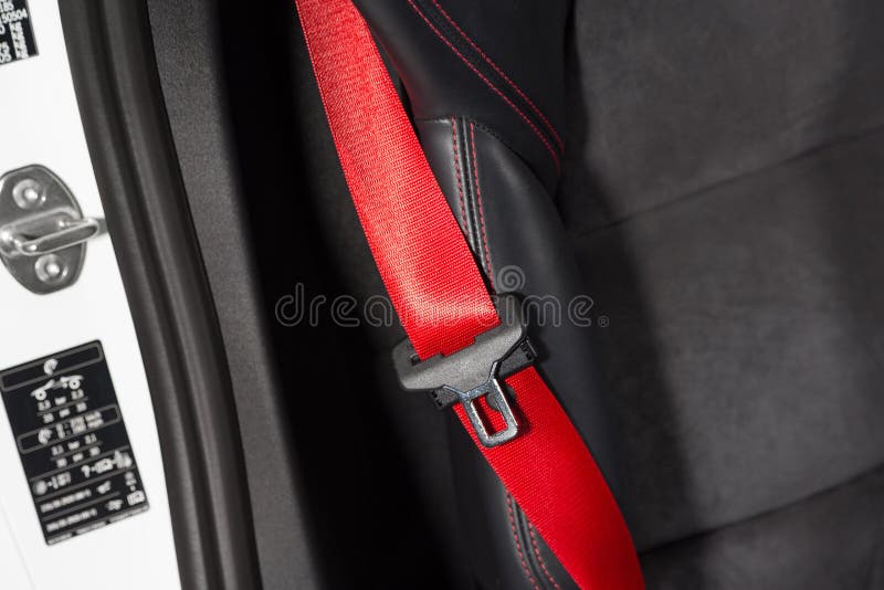 Closeup of a Red Seatbelt of a Modern Car Under the Lights Stock Image