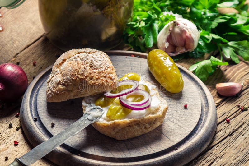 Closeup of sandwich with gherkin and lard