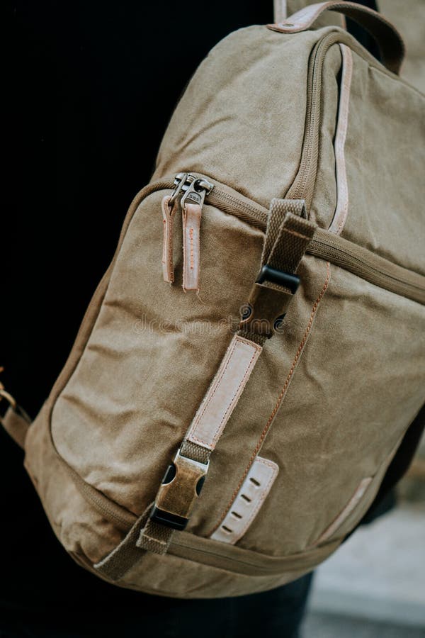 Closeup Shot of Brown Camera Utility Bag with Zippers, Straps and