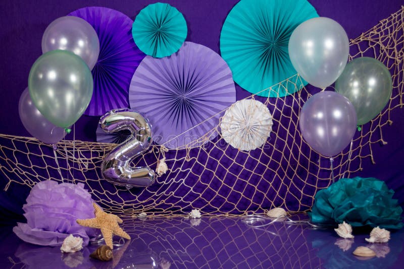 Closeup Shot of Paper Flower Decorations, Balloons, Net, and Number 2 on a  Purple Cloth Background Stock Image - Image of decorations, closeup:  205677391