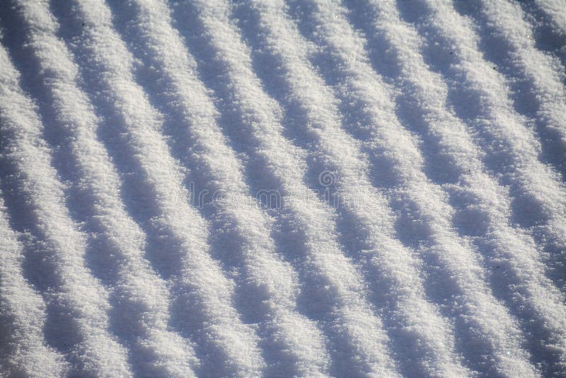 Closeup shot of snow dune background texture royalty free stock photography
