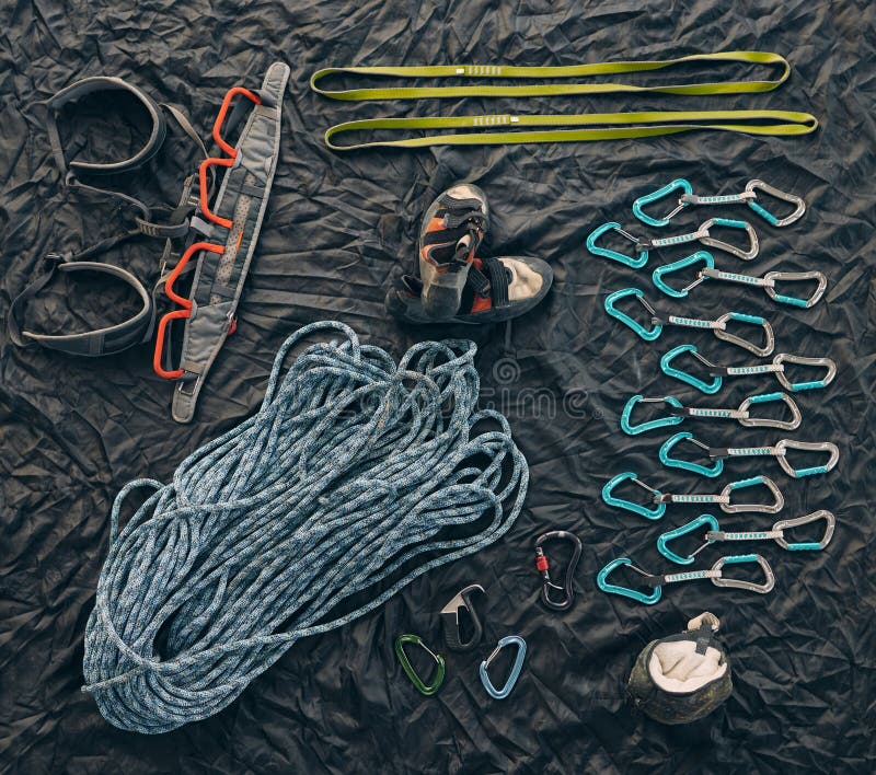 Closeup Shot of a Variety of Carabiner Hooks, Rope, and Other Safety ...