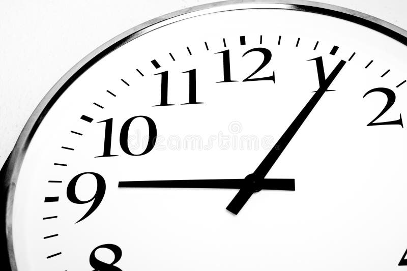 Closeup Shot of a White Clock with Black Numbers and Hands Stock Photo Image of deadline