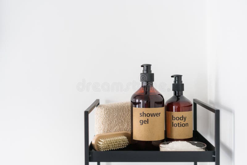 Cosmetics products for body care, bath sponge and nail brush on shelf