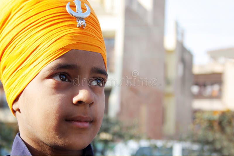Closeup Of A Sikh Child With Saffron Turban Editorial Stock Image