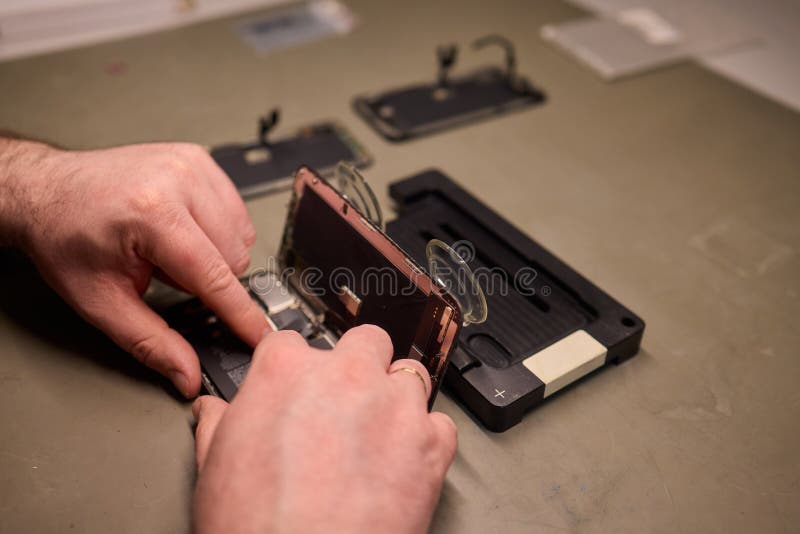 Expert Smartphone Repair Using Advanced Precision Tools for Optimal Performance and Quality stock photography