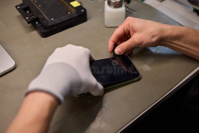 Expert Smartphone Repair Using Advanced Precision Tools for Optimal Performance and Quality stock photos