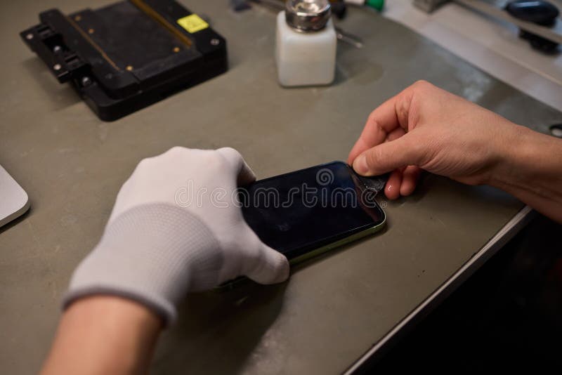 Expert Smartphone Repair Using Advanced Precision Tools for Optimal Performance and Quality stock photo