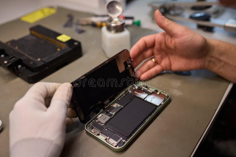 Expert Smartphone Repair Using Advanced Precision Tools for Optimal Performance and Quality stock image