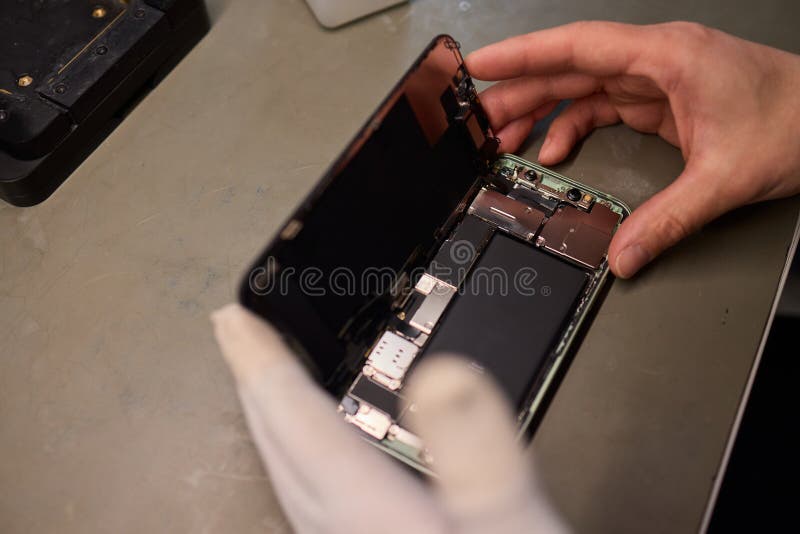 Expert Smartphone Repair Using Advanced Precision Tools for Optimal Performance and Quality royalty free stock photography