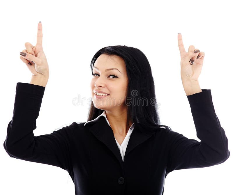 Closeup of smiling young businesswoman pointing to the top of th