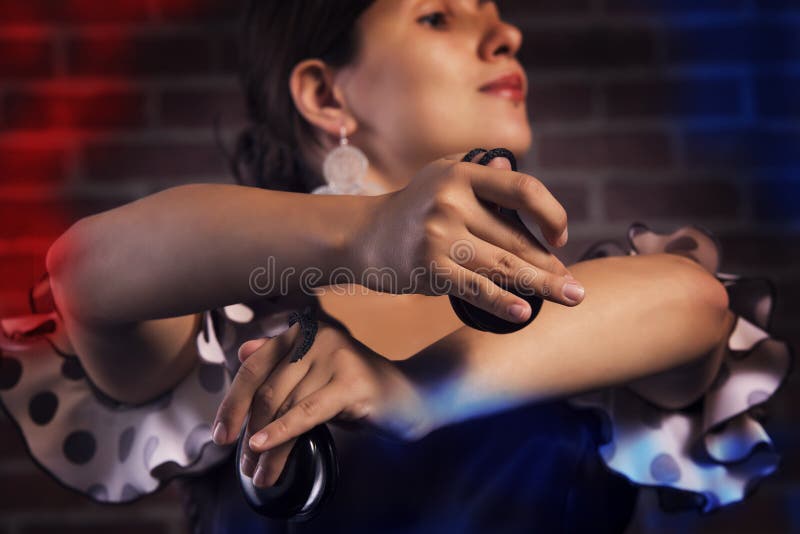 Closeup of a spanish castanets player hands